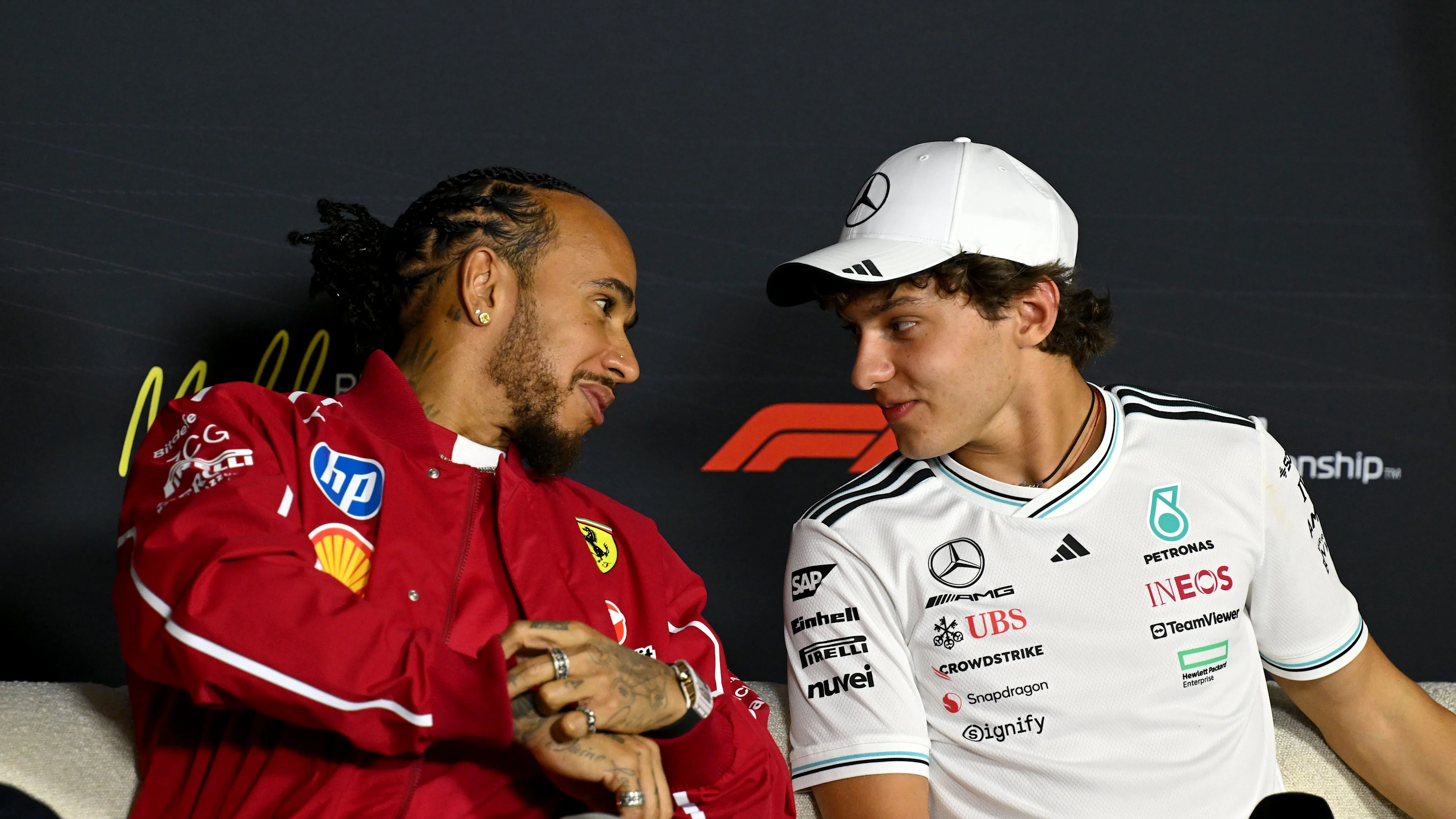 MELBOURNE, AUSTRALIA - MARCH 13: Lewis Hamilton of Great Britain and Scuderia Ferrari and Andrea